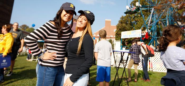 2 women posing for a camera